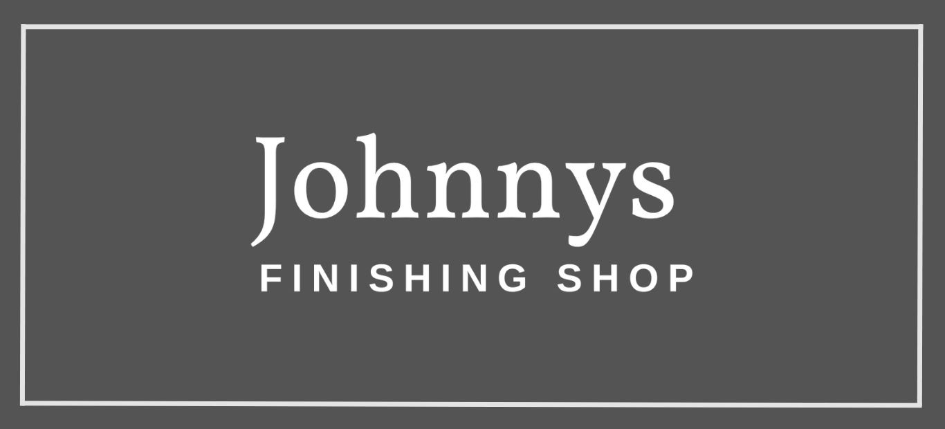 Johnny's Finishing Shop logo